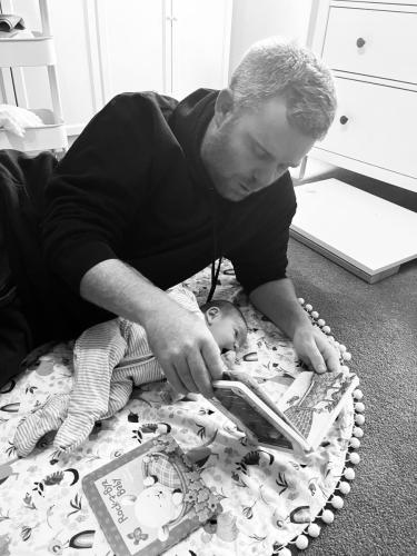 Reading to newborn george